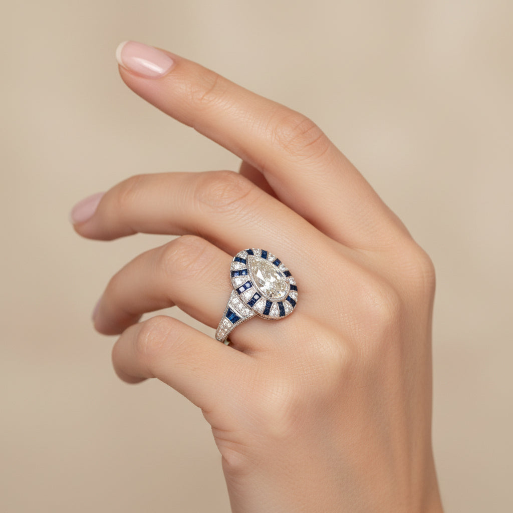 14K White Gold Pear Shaped Diamond and Baguette Sapphire