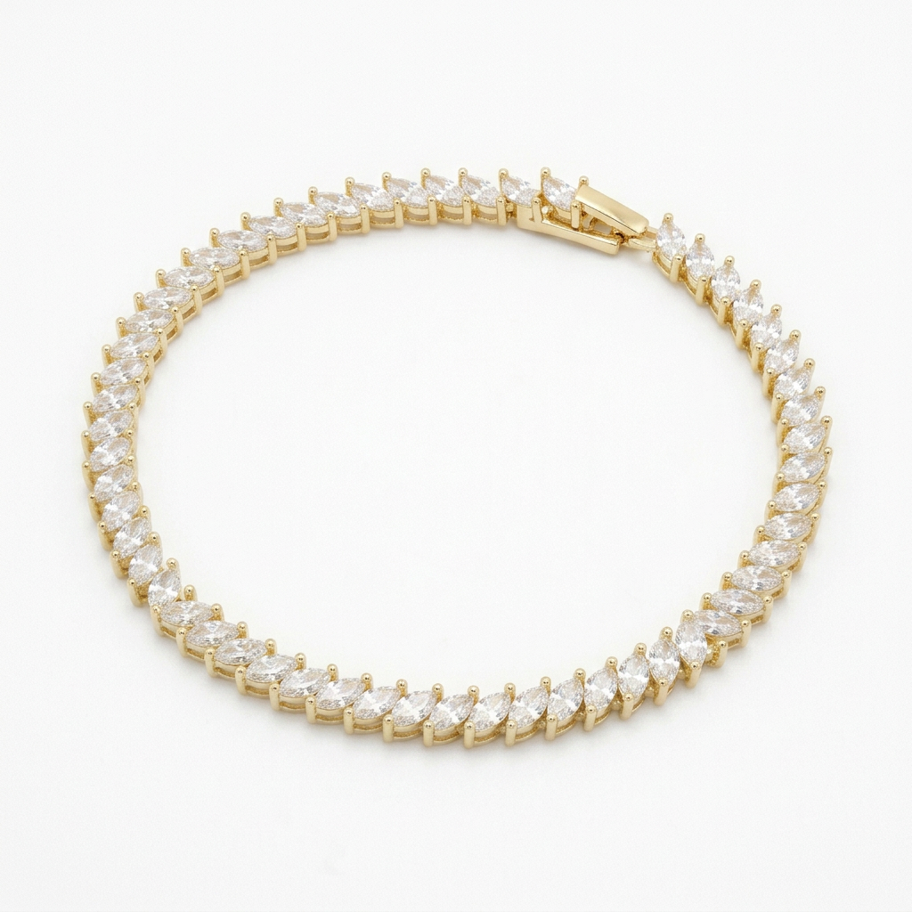 A yellow gold tennis bracelet featuring a continuous row of clear marquise-cut gemstones in a prong setting, shown on a plain white background.